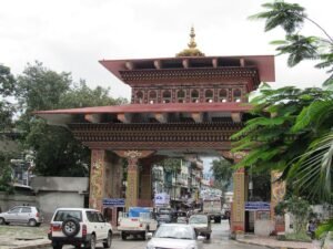 YourTourExpert Bhutan Gate entry point connecting Jaigaon West Bengal to Phuentsholing Bhutan.